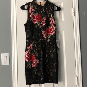 fitted black lace dress